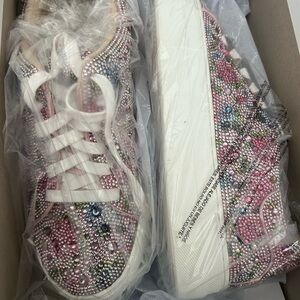 Brand new, never worn,Betsey Johnson Pink and White Sneakers with Graphic Design